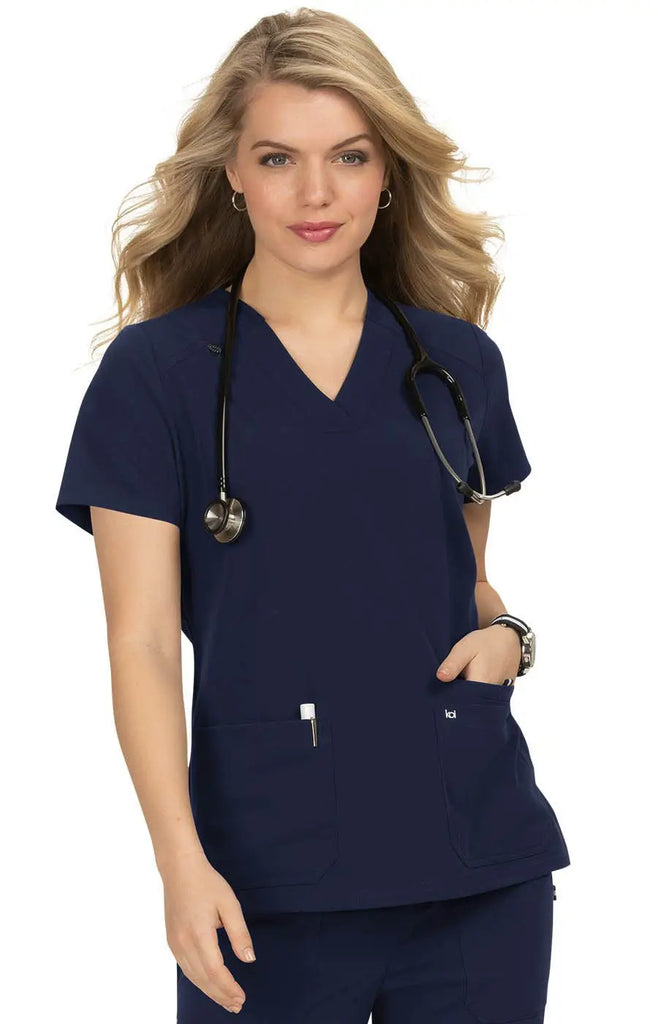 Koi Scrubs Hustle and Heart Top Navy | scrub-supply.com