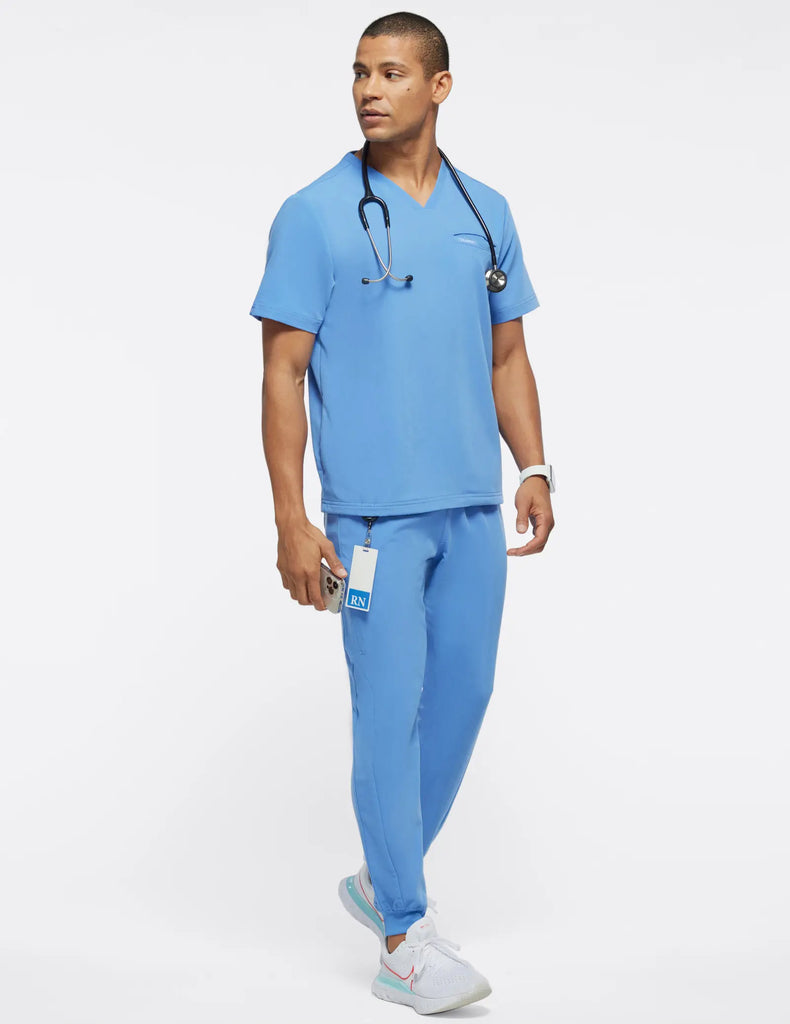 Jaanuu Scrubs Men's 4-Pocket V-Neck Scrub Top Ceil Blue | scrub-supply.com