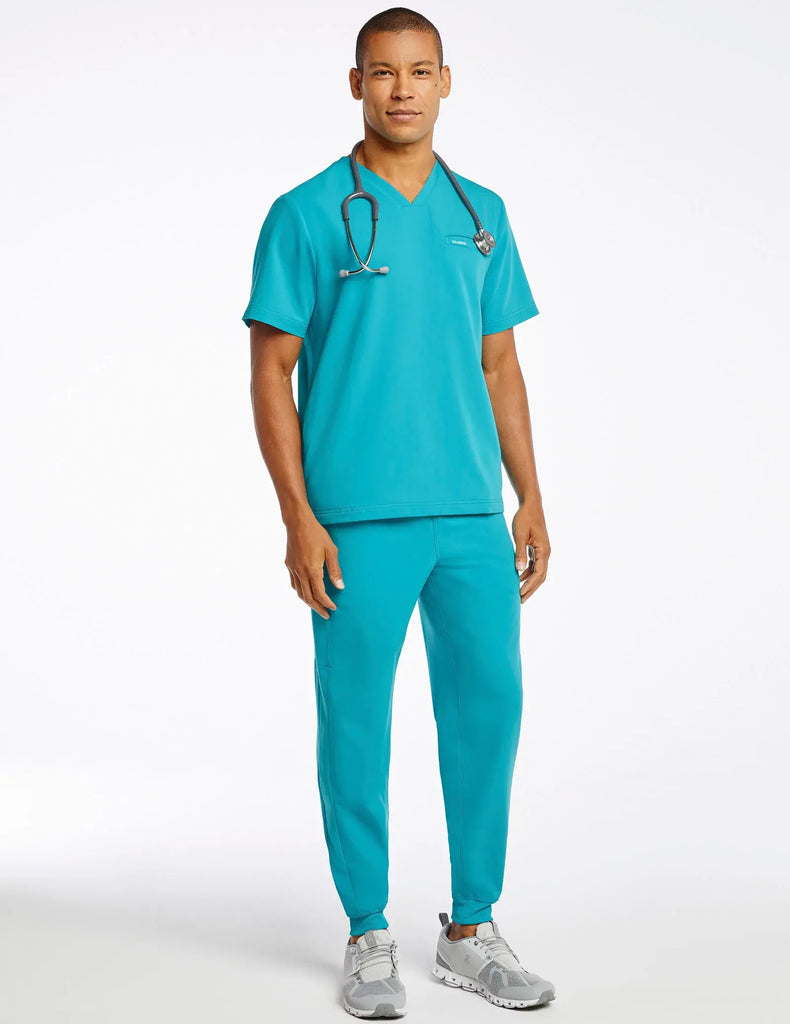 Jaanuu Scrubs Men's 4-Pocket V-Neck Scrub Top Teal | scrub-supply.com