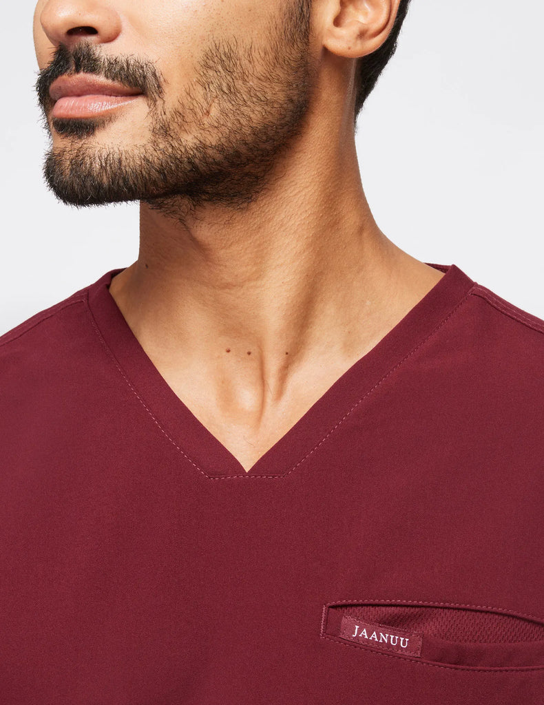 Jaanuu Scrubs Men's 4-Pocket V-Neck Scrub Top Wine | scrub-supply.com