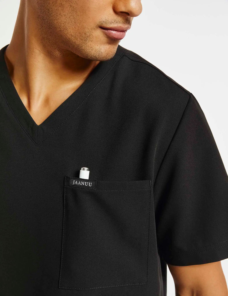 Jaanuu Scrubs Men's 2-Pocket V-Neck Top Black | scrub-supply.com