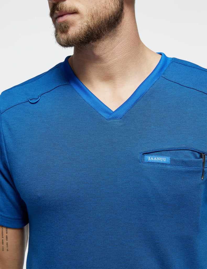 Jaanuu Scrubs Men's Evolve Side-Zip Scrub Top Heather Royal Blue | scrub-supply.com