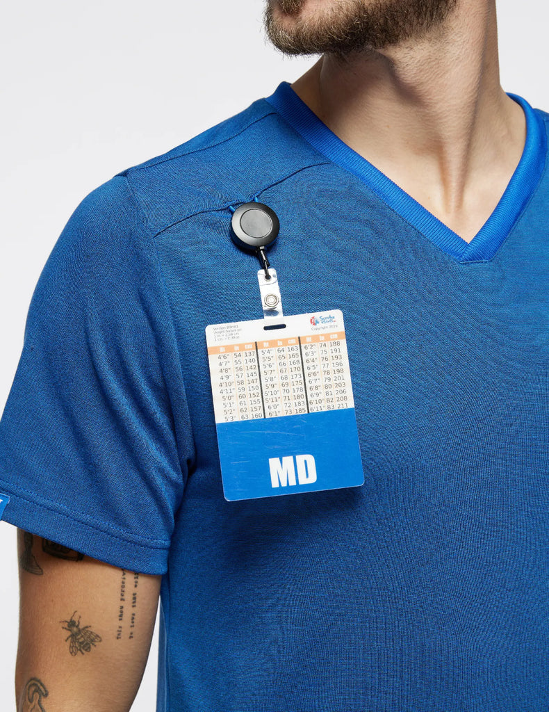 Jaanuu Scrubs Men's Evolve Side-Zip Scrub Top Heather Royal Blue | scrub-supply.com