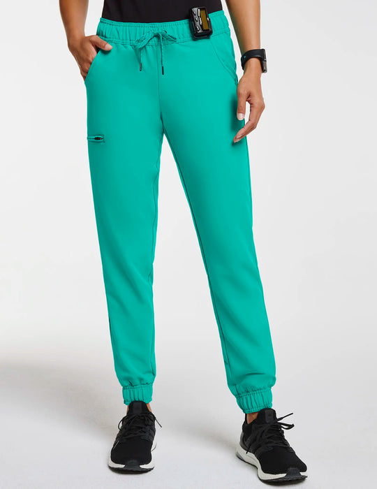 Jaanuu Scrubs Women's 5-Pocket Skinny Scrub Jogger Surgical Green | scrub-supply.com