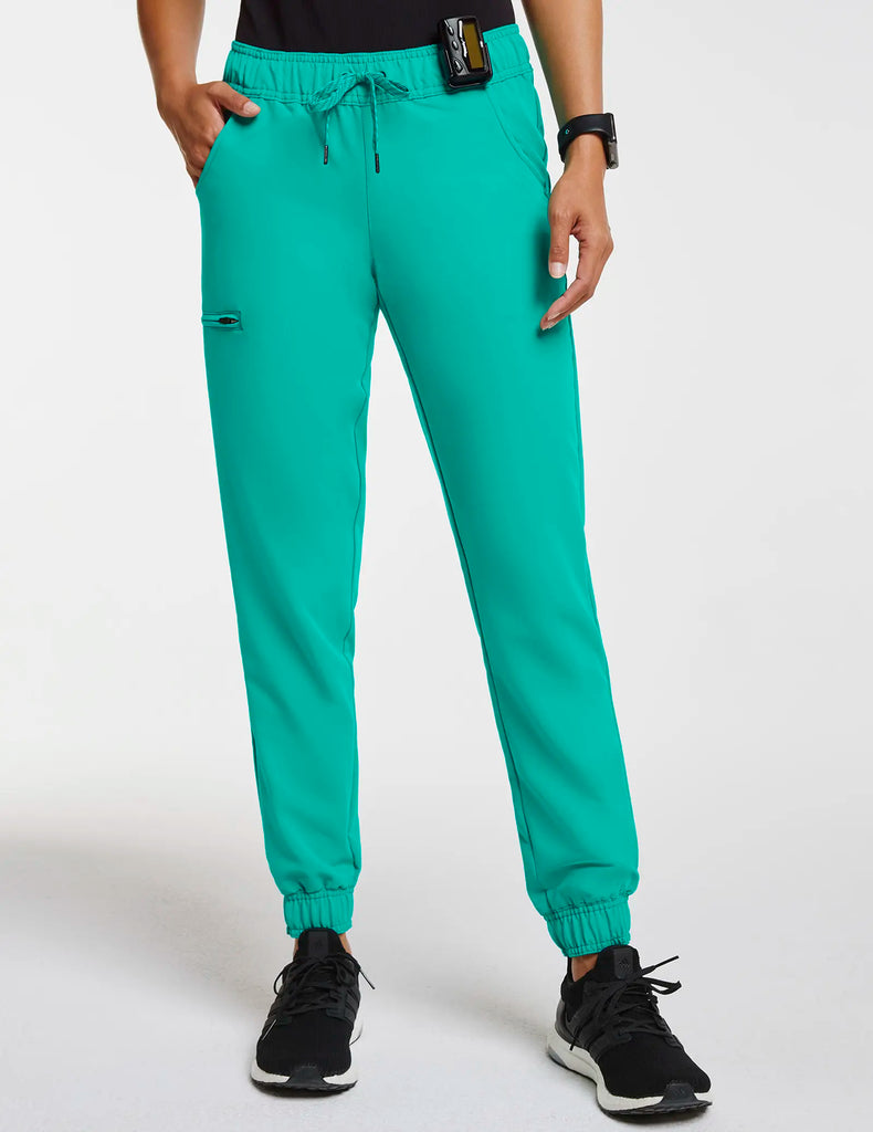 Jaanuu Scrubs Women's 5-Pocket Skinny Scrub Jogger Surgical Green | scrub-supply.com