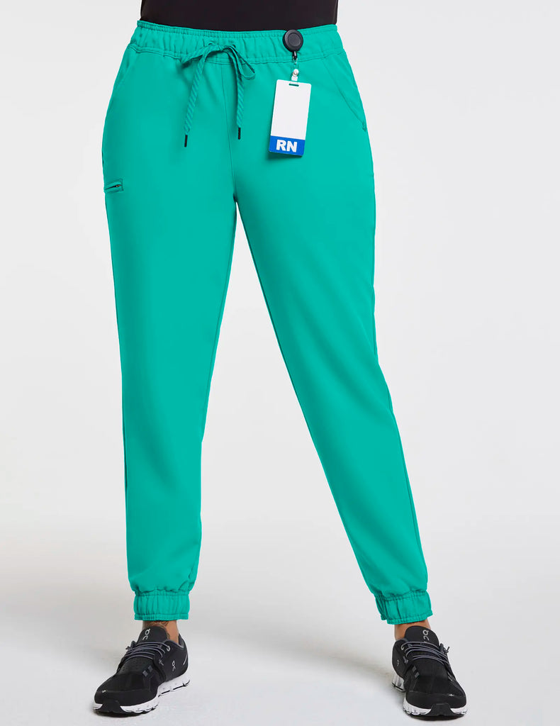 Jaanuu Scrubs Women's 5-Pocket Skinny Scrub Jogger Surgical Green | scrub-supply.com