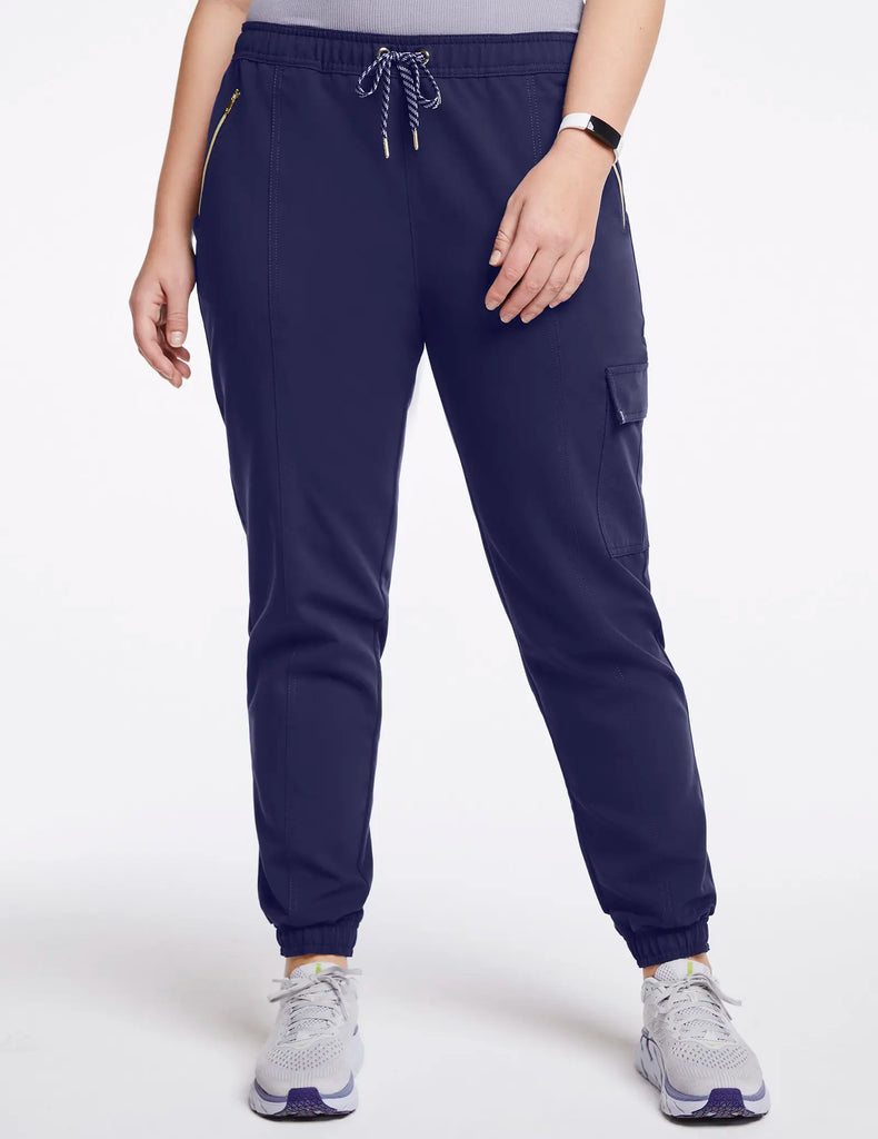 Jaanuu Scrubs Women's Essential Gold Zip Jogger Navy | scrub-supply.com