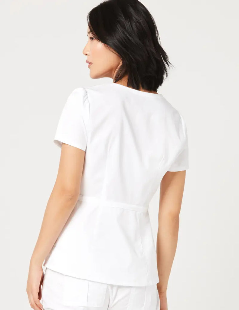 Jaanuu Scrubs Women's Peplum Top White | scrub-supply.com