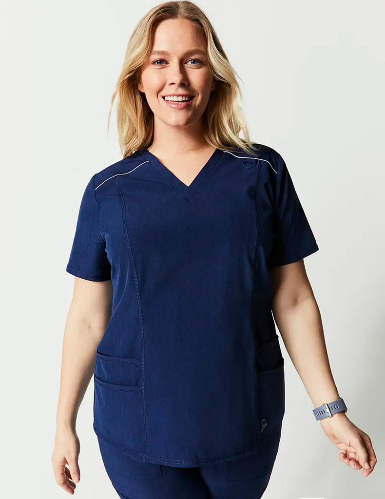 Jaanuu Scrubs Women's Shift V-Neck Top Heathered Navy | scrub-supply.com