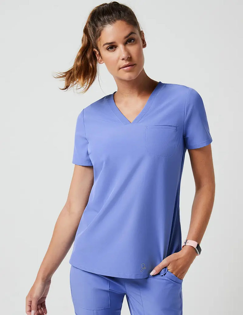 Jaanuu Scrubs Women's Stride Ribbed V-Neck Top Ceil Blue | scrub-supply.com