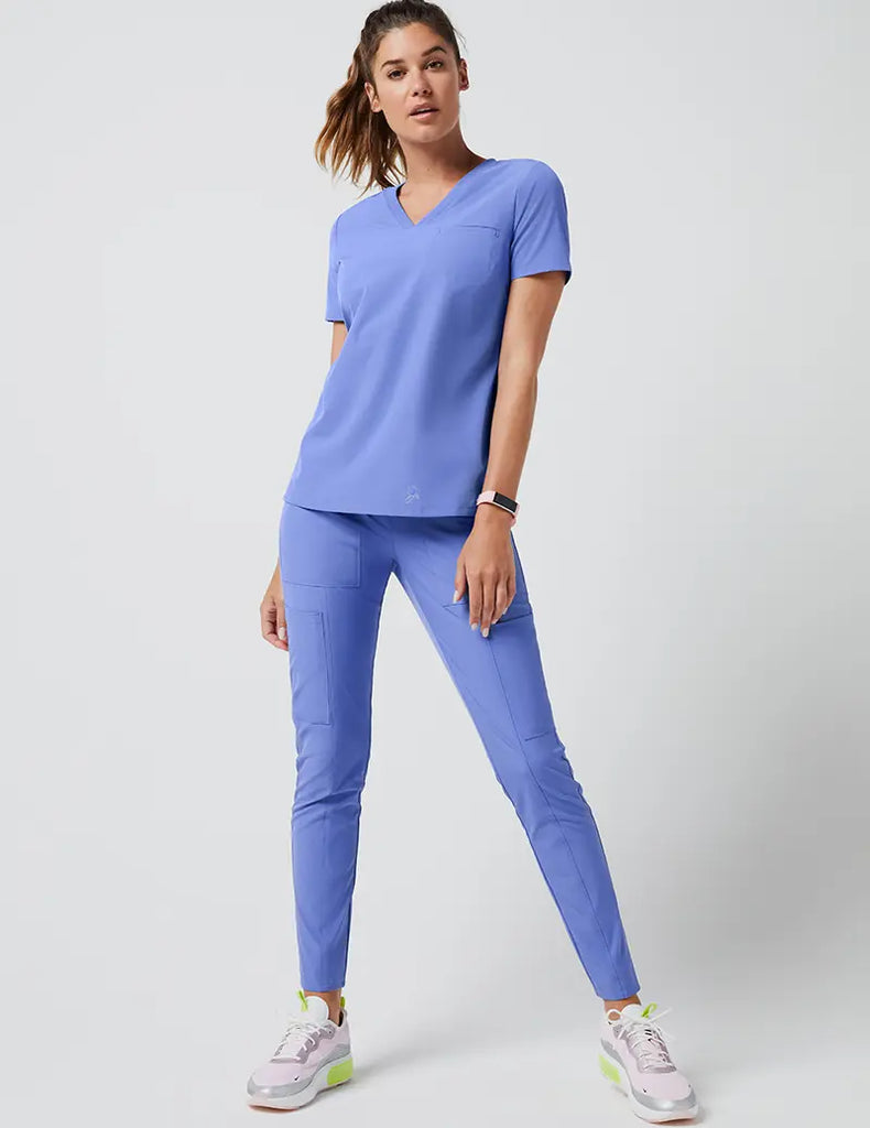 Jaanuu Scrubs Women's Stride Ribbed V-Neck Top Ceil Blue | scrub-supply.com