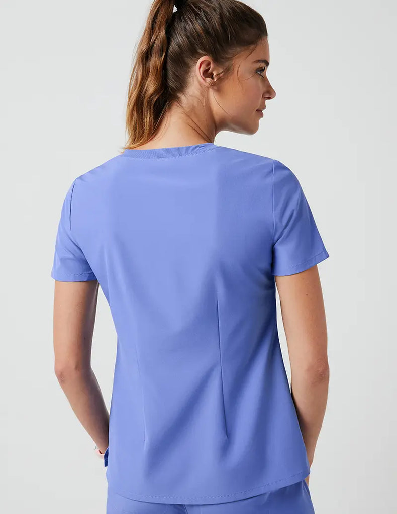 Jaanuu Scrubs Women's Stride Ribbed V-Neck Top Ceil Blue | scrub-supply.com