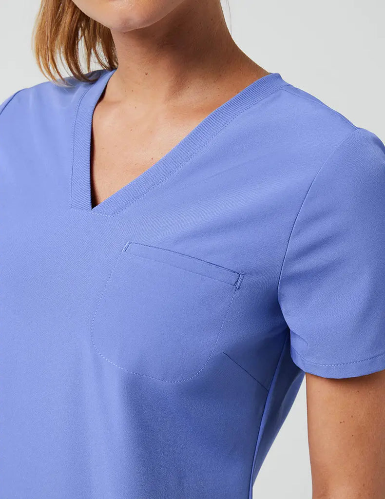 Jaanuu Scrubs Women's Stride Ribbed V-Neck Top Ceil Blue | scrub-supply.com