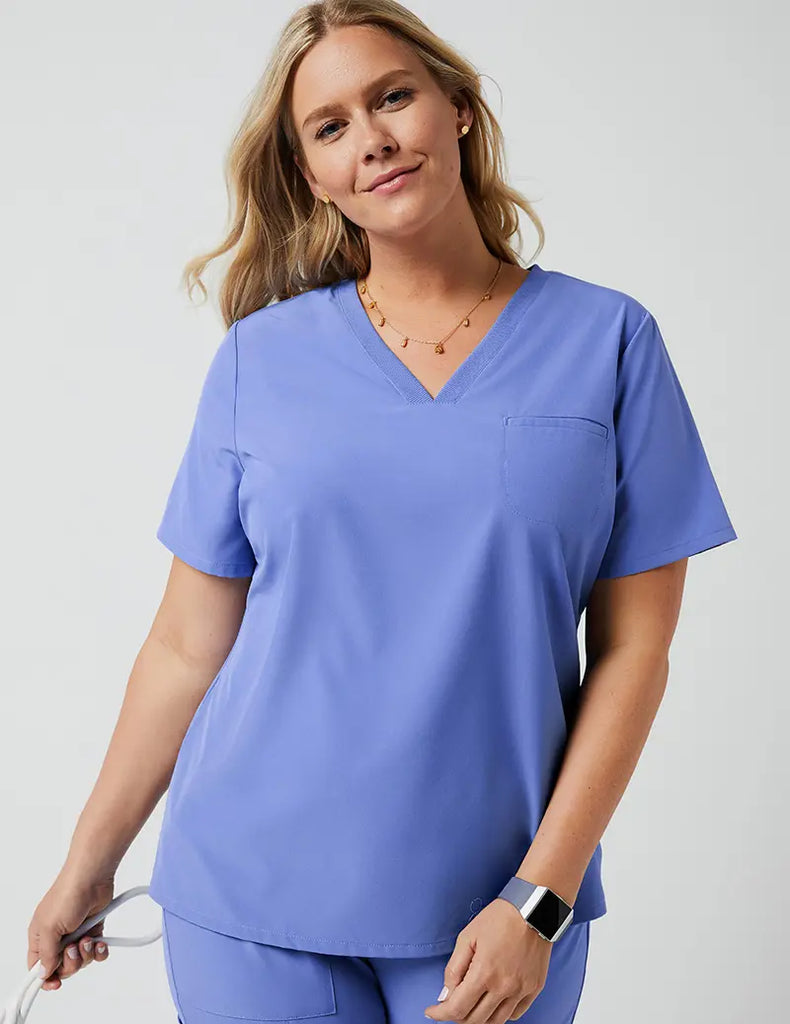 Jaanuu Scrubs Women's Stride Ribbed V-Neck Top Ceil Blue | scrub-supply.com