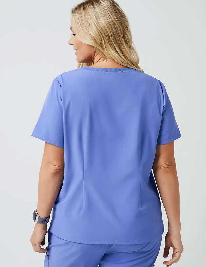 Jaanuu Scrubs Women's Stride Ribbed V-Neck Top Ceil Blue | scrub-supply.com