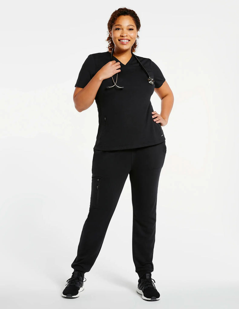 Jaanuu Scrubs Women's 2-Pocket Side-Rib Scrub Top Black | scrub-supply.com