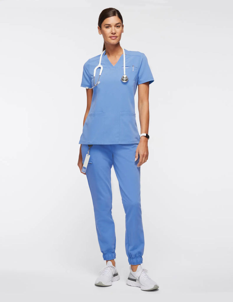 Jaanuu Scrubs Women's 3-Pocket Scrub Top Ceil Blue | scrub-supply.com