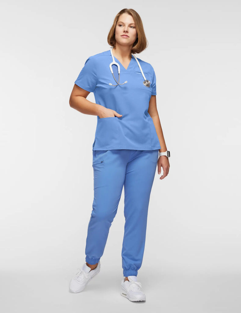 Jaanuu Scrubs Women's 3-Pocket Scrub Top Ceil Blue | scrub-supply.com