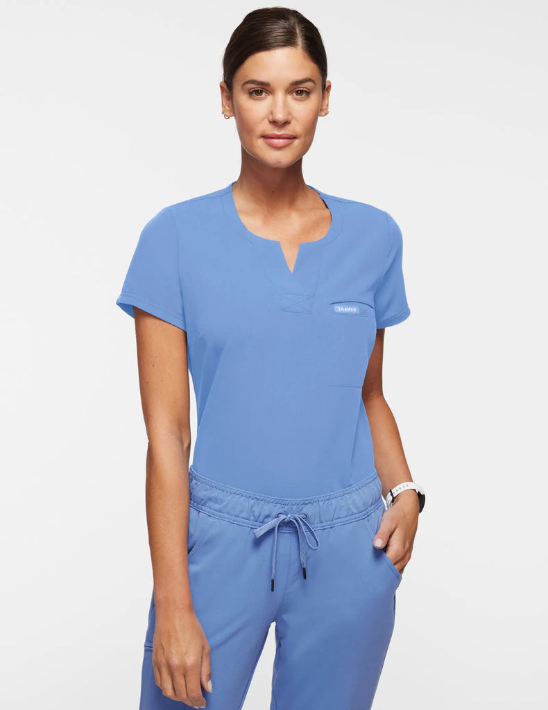 Jaanuu Scrubs Women's 1-Pocket Tuck-In Scrub Top Ceil Blue | scrub-supply.com