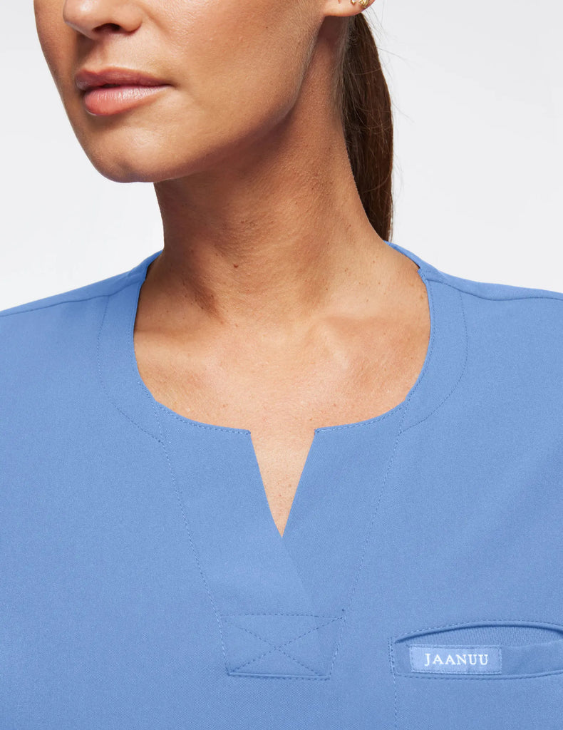 Jaanuu Scrubs Women's 1-Pocket Tuck-In Scrub Top Ceil Blue | scrub-supply.com