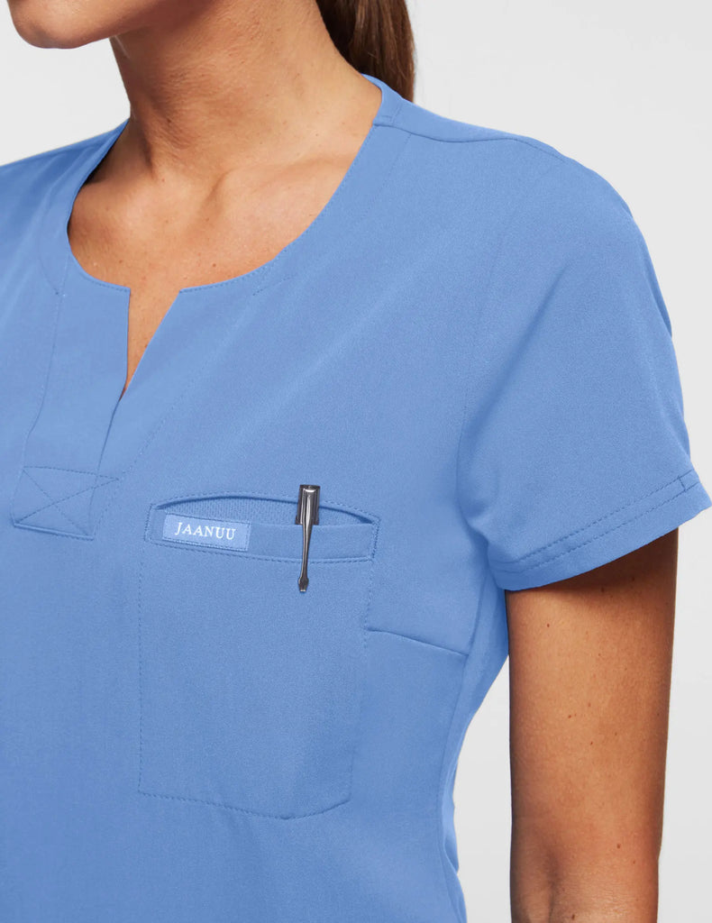 Jaanuu Scrubs Women's 1-Pocket Tuck-In Scrub Top Ceil Blue | scrub-supply.com