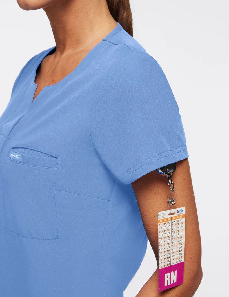 Jaanuu Scrubs Women's 1-Pocket Tuck-In Scrub Top Ceil Blue | scrub-supply.com