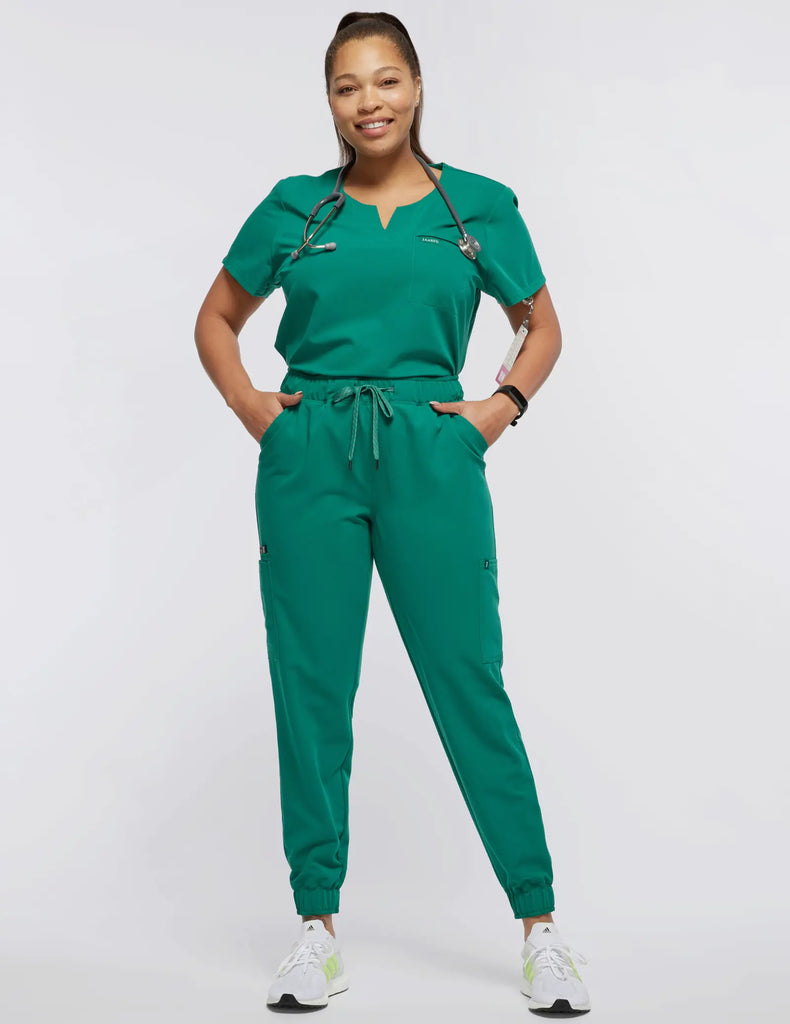 Jaanuu Scrubs Women's 1-Pocket Tuck-In Scrub Top Hunter Green | scrub-supply.com