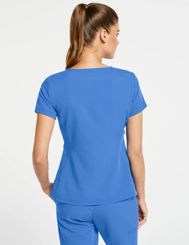 Jaanuu Scrubs Women's 3-Pocket Mock Wrap Top Ceil Blue | scrub-supply.com