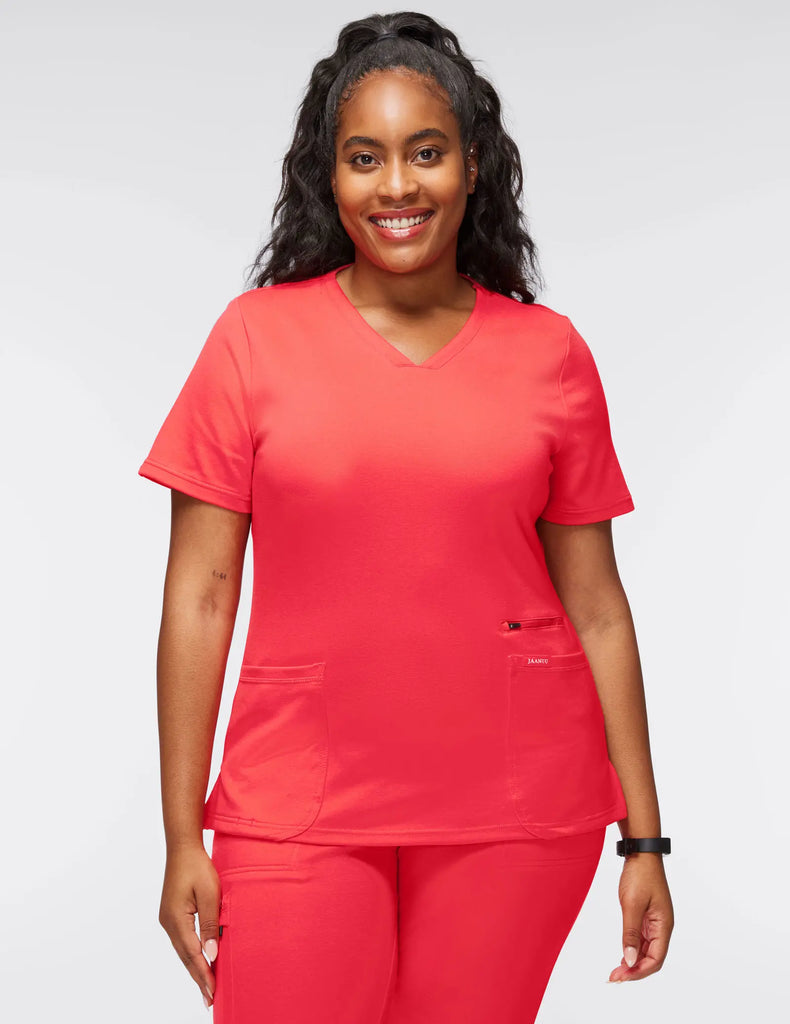 Jaanuu Scrubs Women's 4-Pocket V-Neck Scrub Top Coral | scrub-supply.com