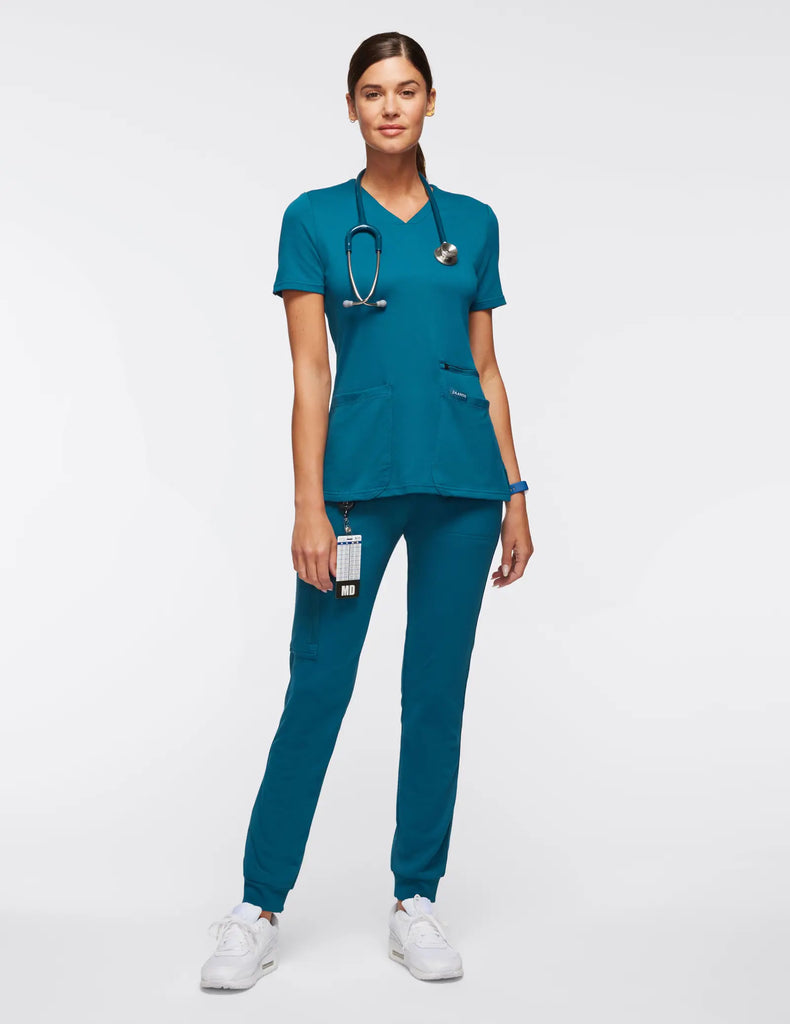 Jaanuu Scrubs Women's 4-Pocket V-Neck Scrub Top Caribbean Blue | scrub-supply.com