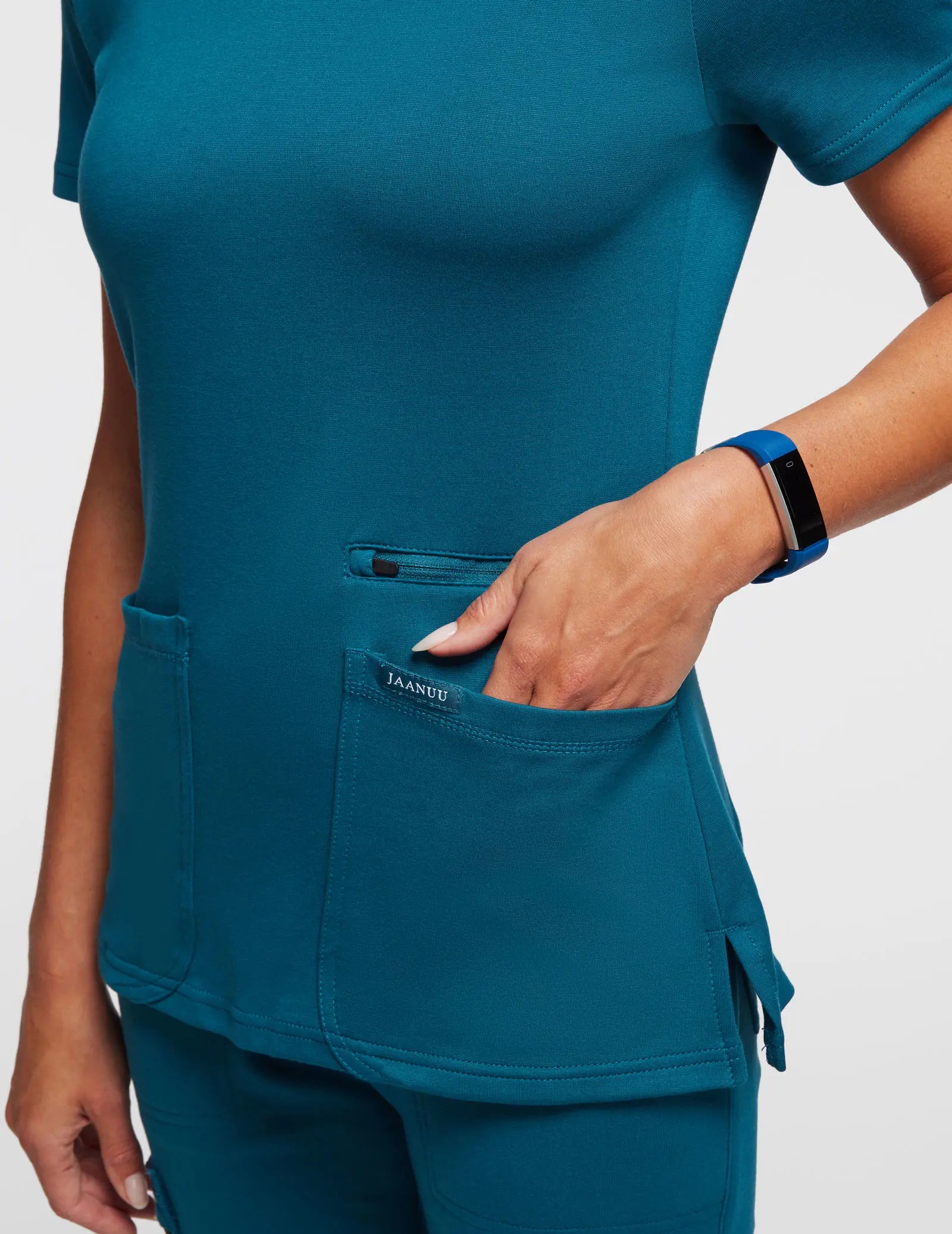 Shop Jaanuu 4-Pocket V-Neck Scrub Top - Caribbean Blue for