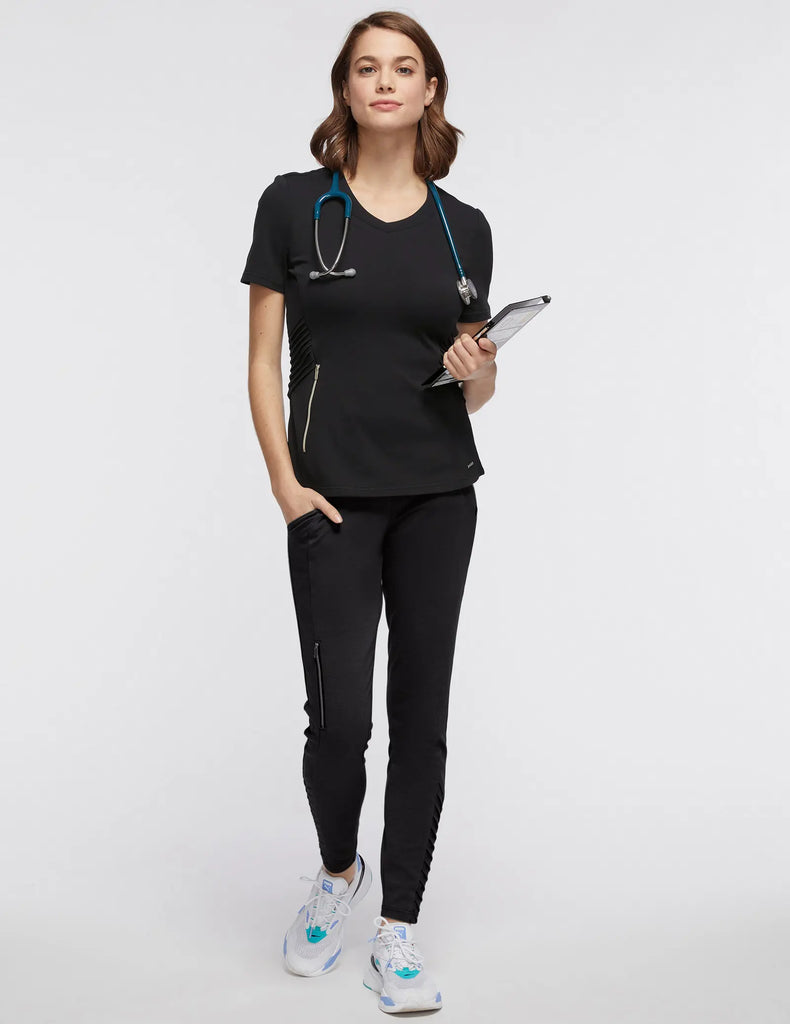 Jaanuu Scrubs Women's Women’s Gold Zip Moto Top Black | scrub-supply.com