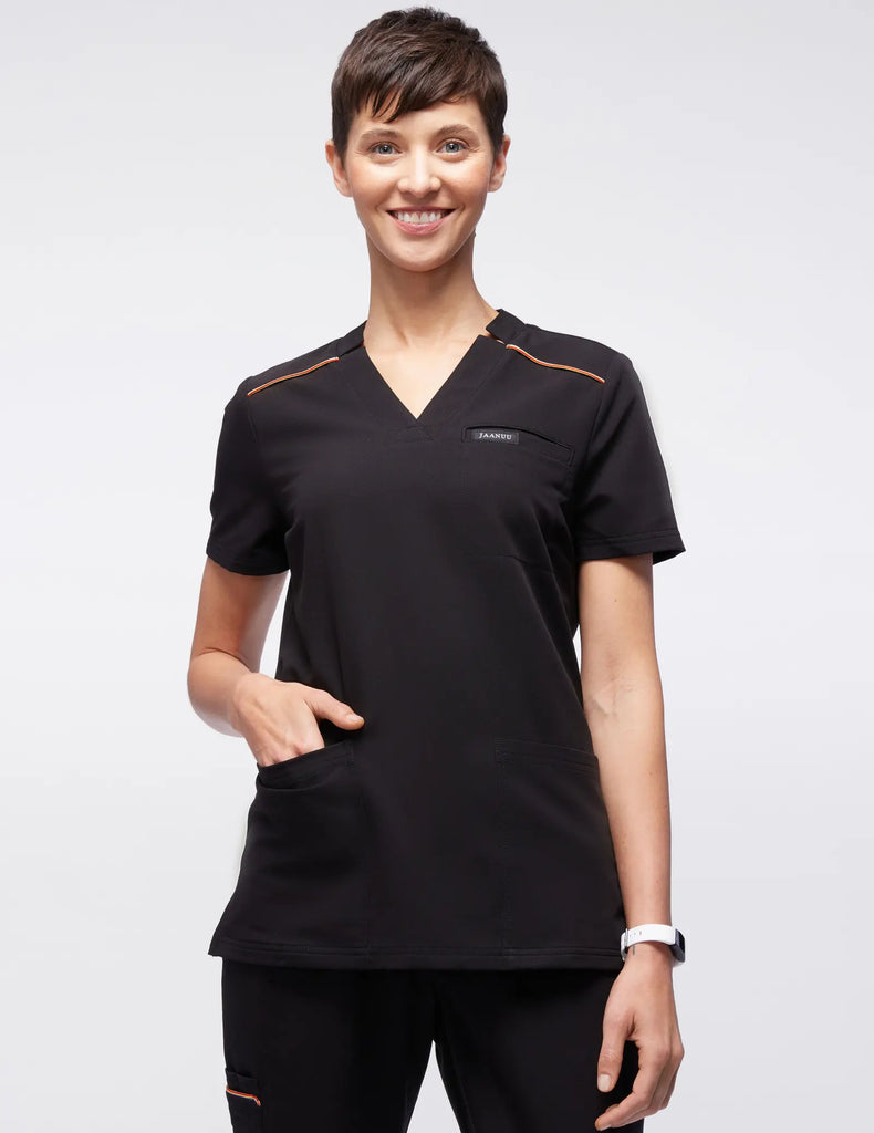 Jaanuu Scrubs Women's Stripe 3-Pocket Scrub Top Black | scrub-supply.com