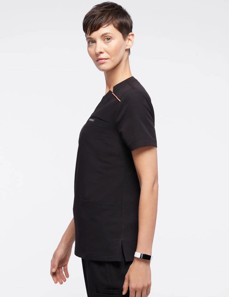 Jaanuu Scrubs Women's Stripe 3-Pocket Scrub Top Black | scrub-supply.com