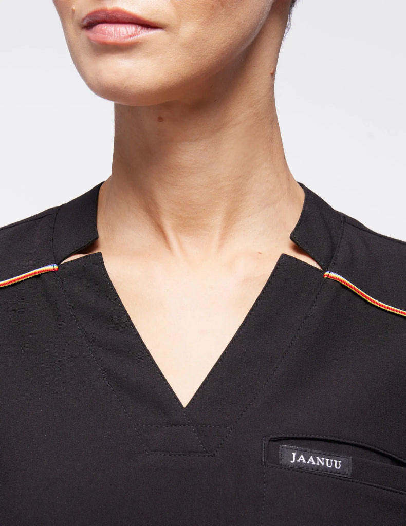 Jaanuu Scrubs Women's Stripe 3-Pocket Scrub Top Black | scrub-supply.com