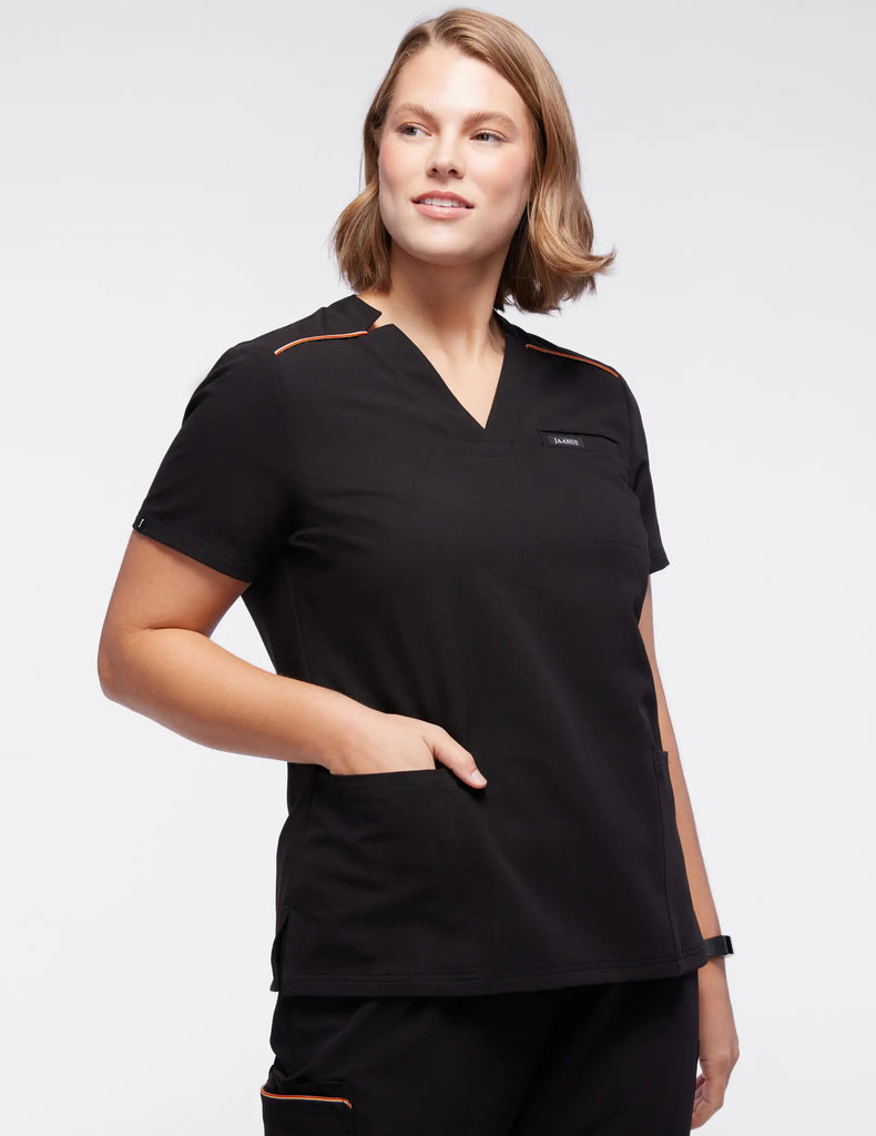 Jaanuu Scrubs Women's Stripe 3-Pocket Scrub Top Black | scrub-supply.com