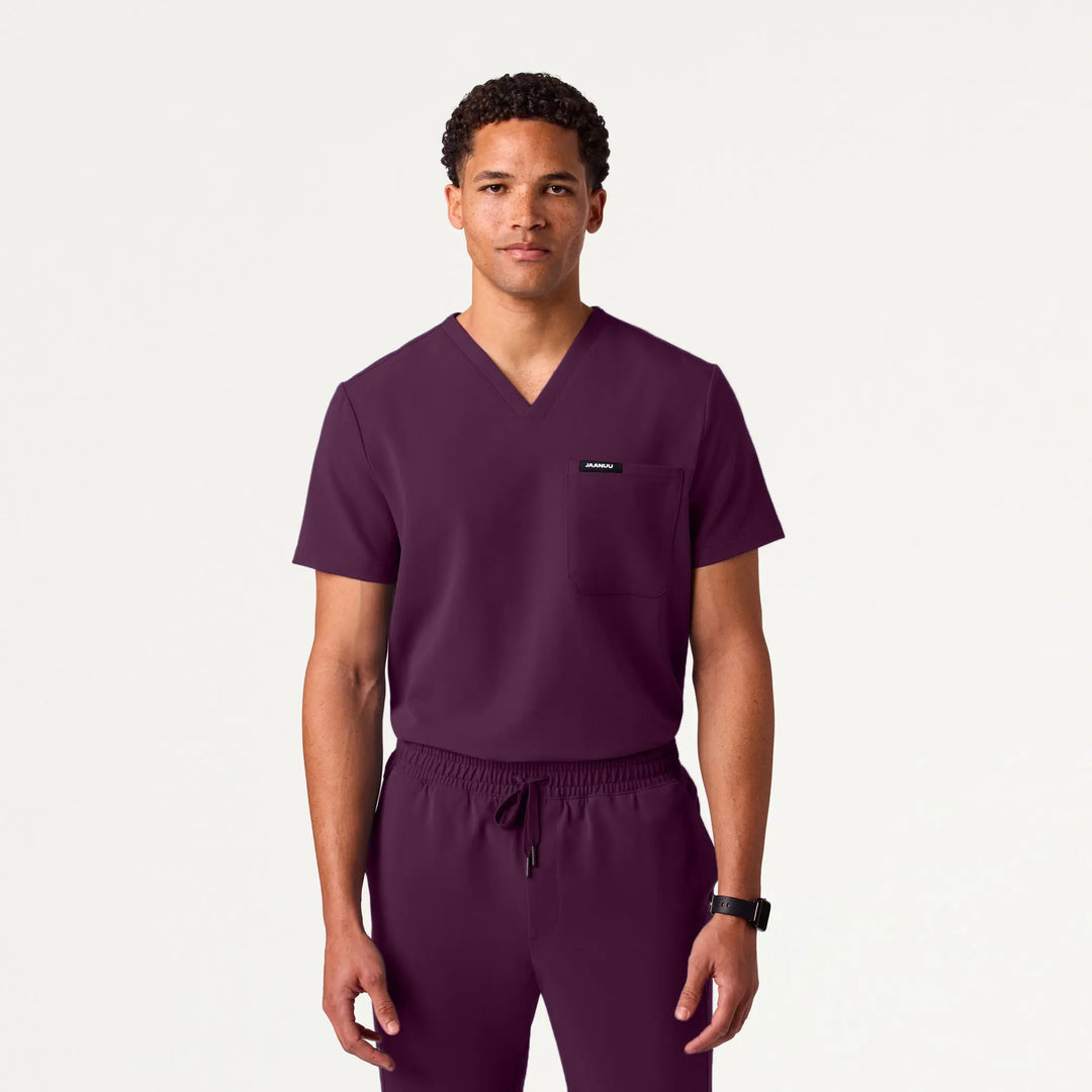 Jaanuu Scrubs Men's Holmes Everyday 1-Pocket Scrub Top Deep Eggplant | scrub-supply.com