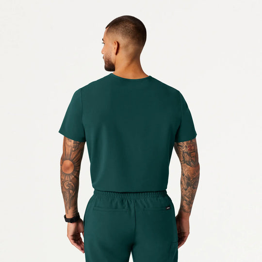 Jaanuu Scrubs Men's Holmes 1-Pocket Scrub Top Midnight Green | scrub-supply.com