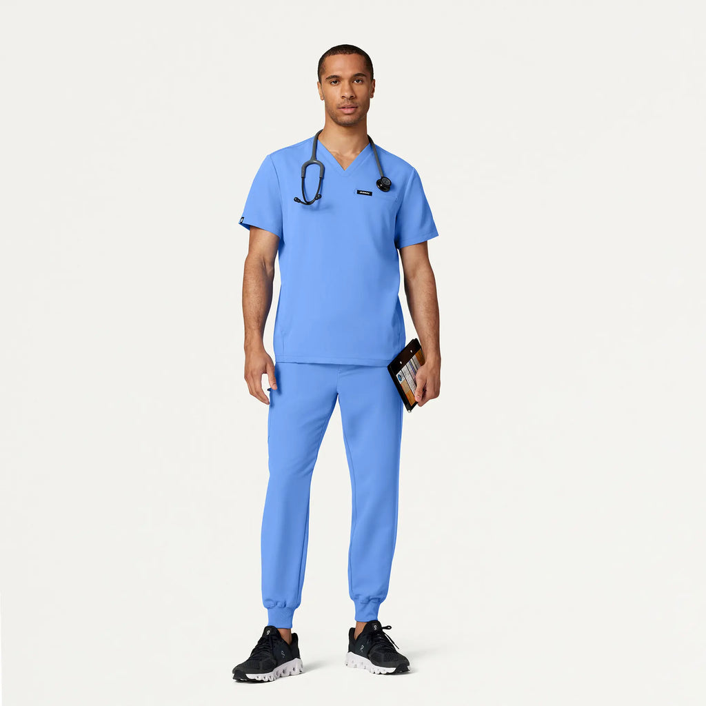 Jaanuu Scrubs Men's Platt 3-Pocket Scrub Top Ceil Blue | scrub-supply.com