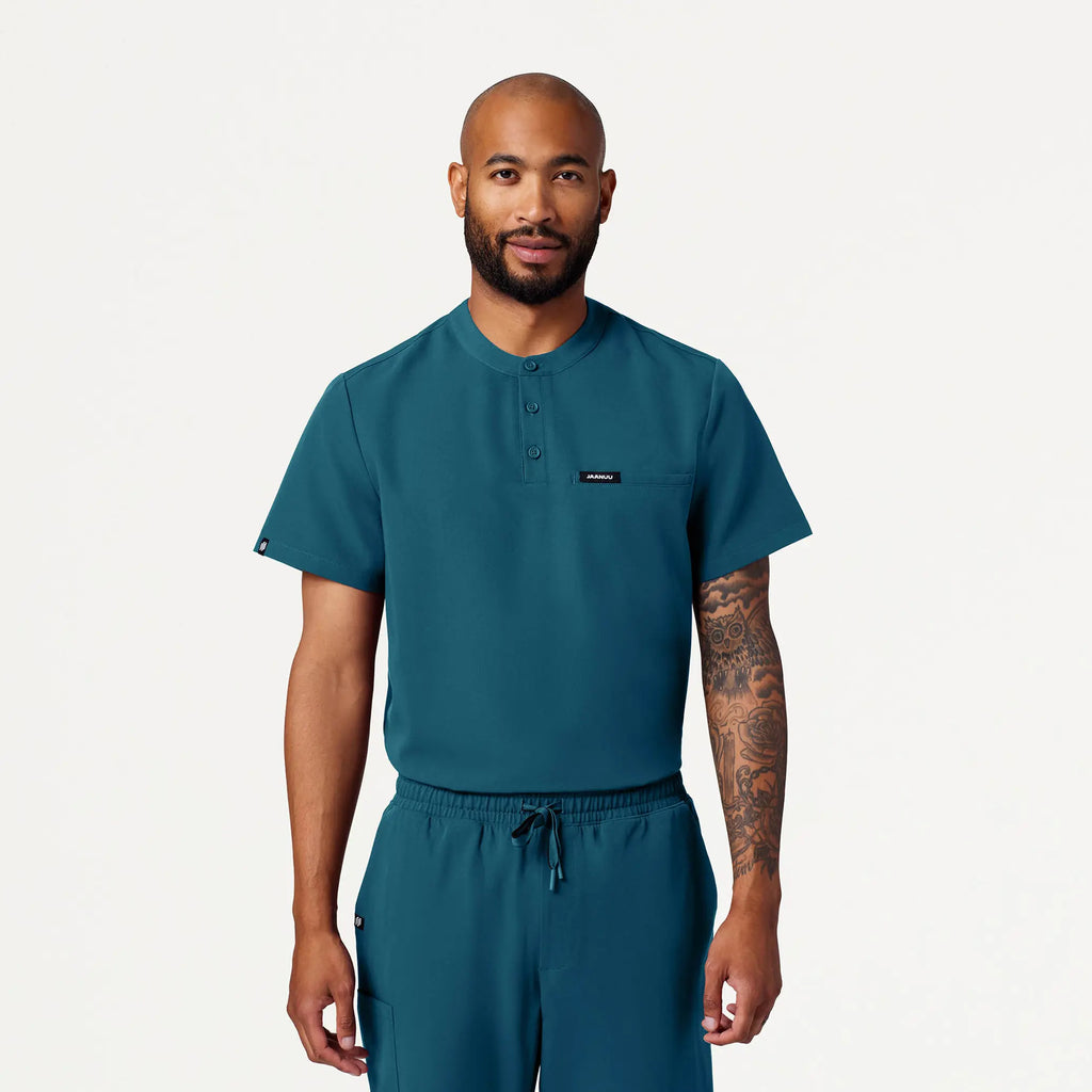 Jaanuu Scrubs Men's Reeve Henley Scrub Top Caribbean Blue | scrub-supply.com