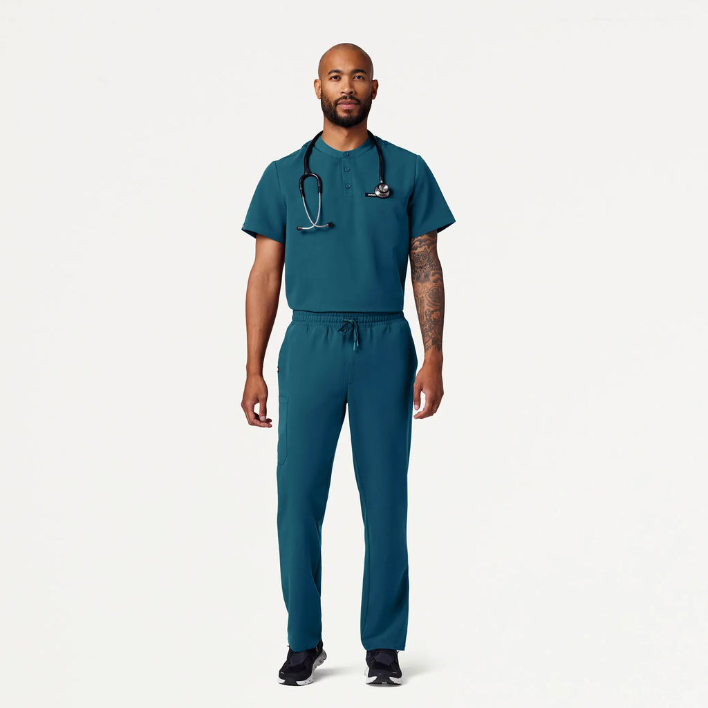 Jaanuu Scrubs Men's Reeve Henley Scrub Top Caribbean Blue | scrub-supply.com