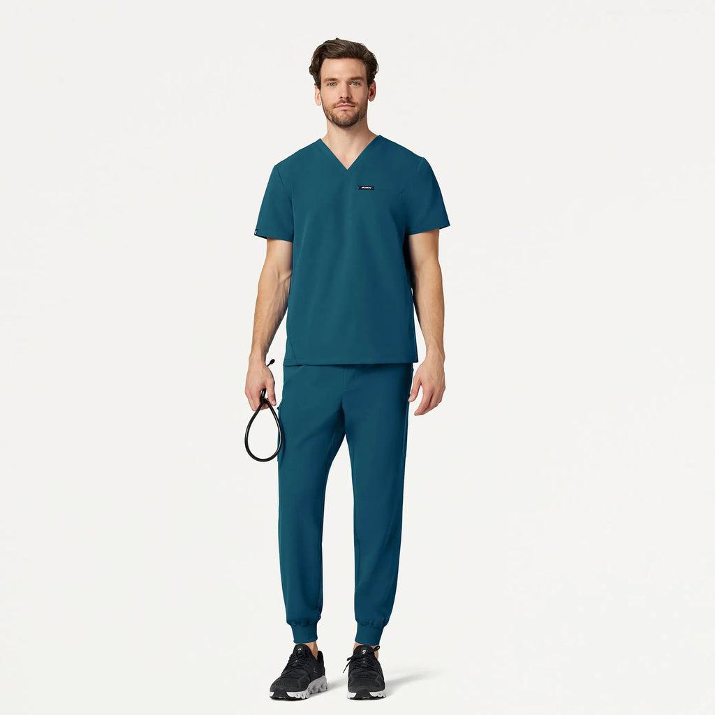 Jaanuu Scrubs Men's Osmo 8-Pocket Scrub Jogger Caribbean Blue | scrub-supply.com