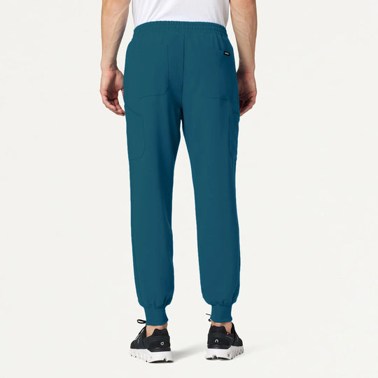 Jaanuu Scrubs Men's Osmo 8-Pocket Scrub Jogger Caribbean Blue | scrub-supply.com