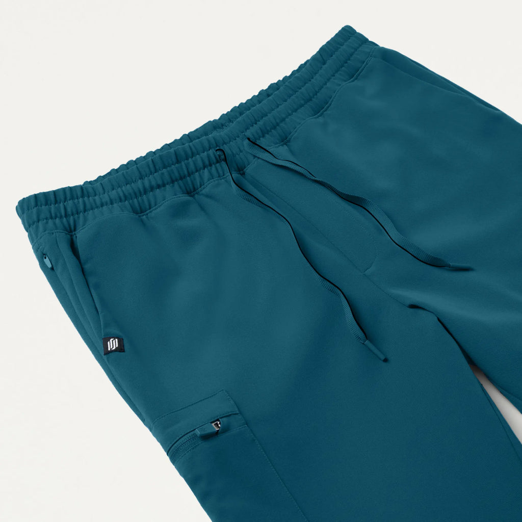 Jaanuu Scrubs Men's Osmo 8-Pocket Scrub Jogger Caribbean Blue | scrub-supply.com