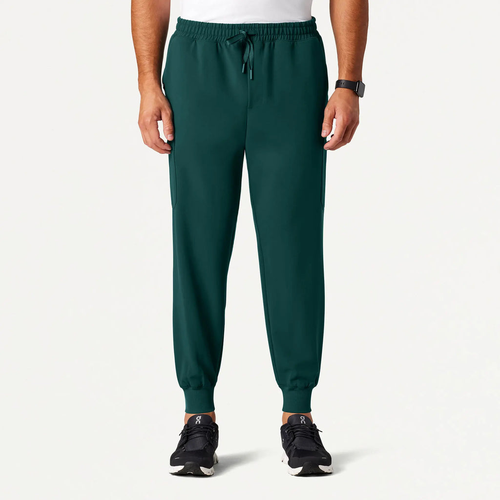 Jaanuu Scrubs Men's Osmo 8-Pocket Scrub Jogger Midnight Green | scrub-supply.com