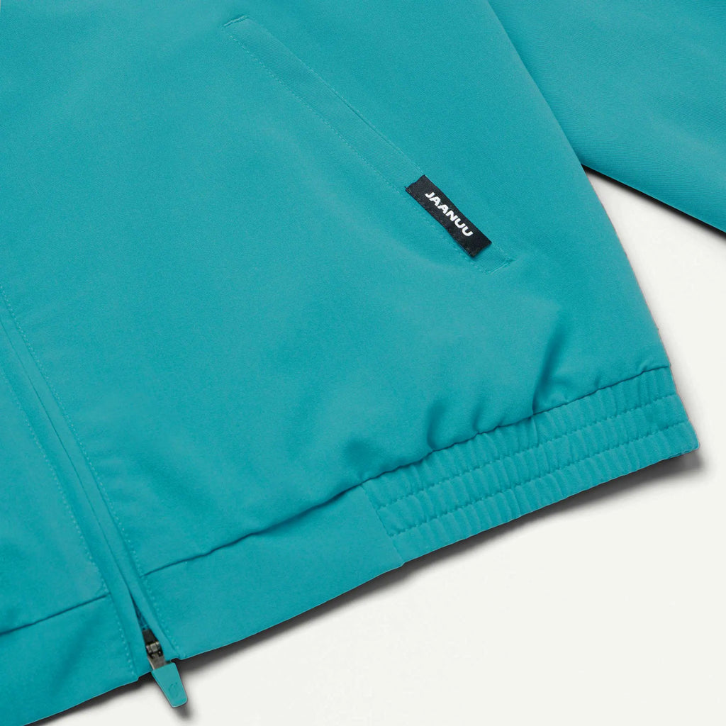 Jaanuu Scrubs Men's Wolfe Everyday 6-Pocket Scrub Jacket Aqua | scrub-supply.com