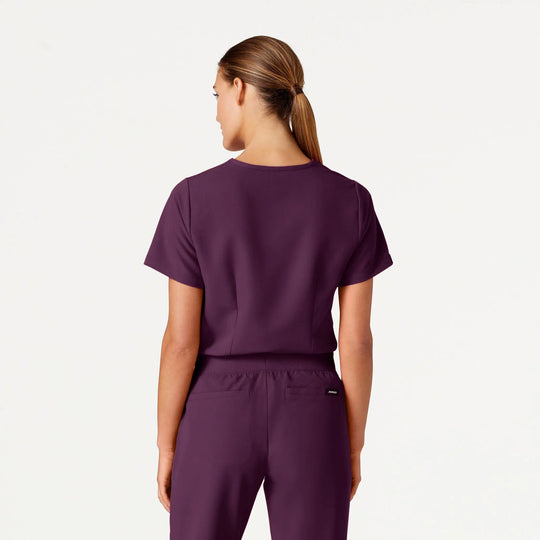 Jaanuu Scrubs Women's Rhena Essential 1-Pocket Scrub Top Deep Eggplant | scrub-supply.com