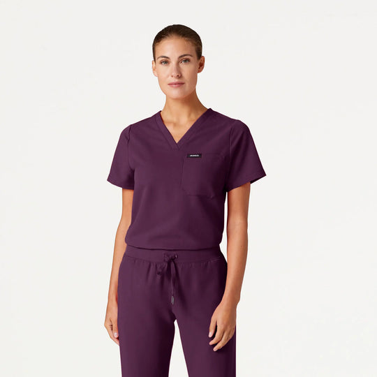 Jaanuu Scrubs Women's Rhena Essential 1-Pocket Scrub Top Deep Eggplant | scrub-supply.com