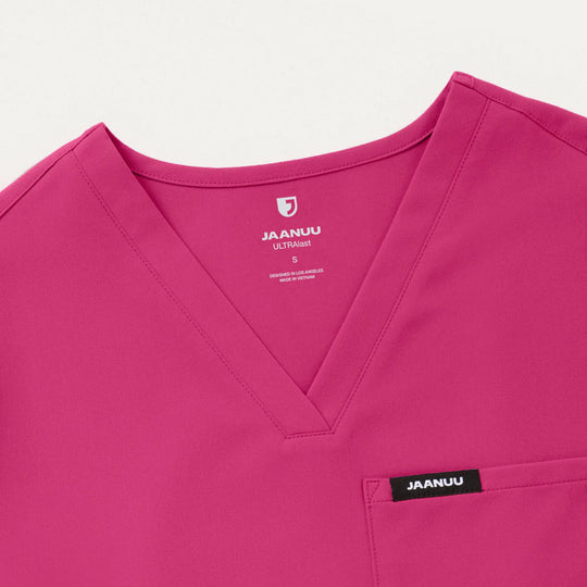 Jaanuu Scrubs Women's Rhena 1-Pocket Scrub Top Wild Berry | scrub-supply.com