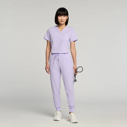 Jaanuu Scrubs Women's Rhena Essential 1-Pocket Scrub Top Lavender | scrub-supply.com
